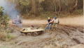 SixWheelerInMudpit1987